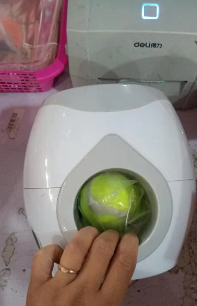 Automatic tennis ball launcher